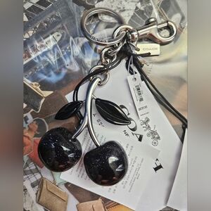 Coach Signature Cherry Bag Charm in Silver and Black